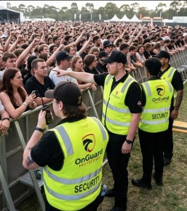 OnGuard Protection Class 1A officers holding a festival crowd barrier in New South Wales